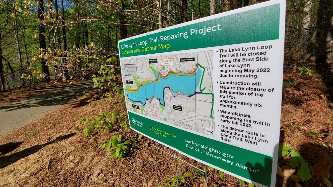 A sign warning pedestrians that a portion of the Lake Lynn trail would be closed for improvements pictured on Friday, April 16, 2022.
