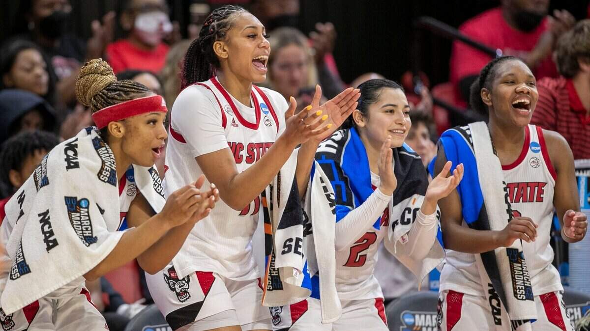 N.C. States Kai Crutchfield (3), Jakia Brown-Turner (11) Raina Perez (2) and Diamond Johnson (0) react during the closing minute of play as the Wolfpack defeats Kansas State to advance to the NCAA Sweet 16 on Monday, March 21, 2022 at Reynolds Coliseum in Raleigh, N.C.