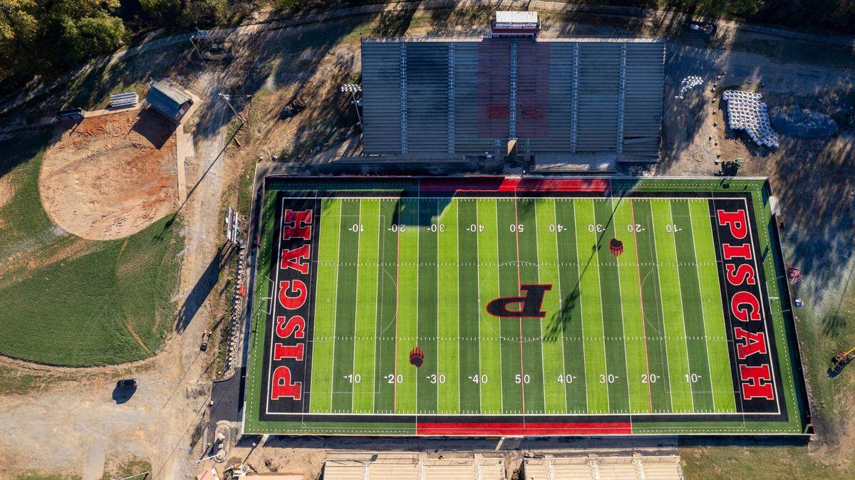 An aerial view of the Pisgah High football field in Canton on Saturday, Oct. 19, 2024. The field was flooded in 2021 by Tropical Storm Fred and again in September 2024 by Tropical Storm Helene.
