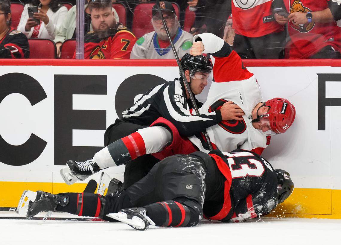Andrei Svechnikov (37) of the Carolina Hurricanes punches Tyler Kleven of the Ottawa Senators during the second period in Game 4 of the first round of the 2026 Stanley Cup Playoffs at Canadian Tire Centre on April 25, 2026 in Ottawa, Canada.