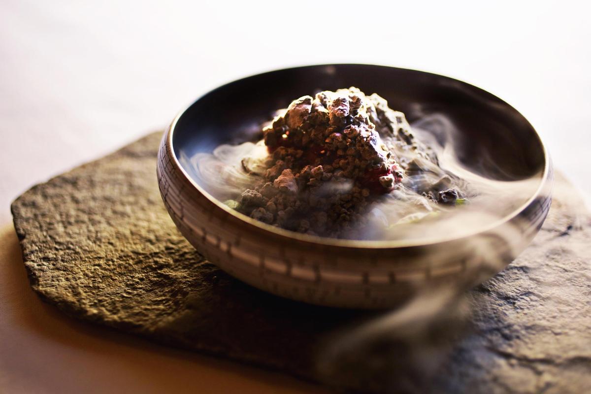 The beet dish from Heron’s first course on the dinner menu is made up of yuzu, walnut, sesame, goat cheese and fermented garlic.