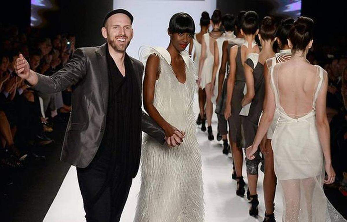 Justin LeBlanc presents his collection at New York Fashion Week during the 2013 season he appeared on “Project Runway.” He has his own clothing label and also competed on “Project Runway All Stars” in 2014.