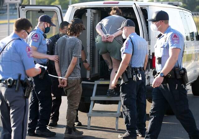 Downtown Raleigh protesters arrested while blocking street | Raleigh ...