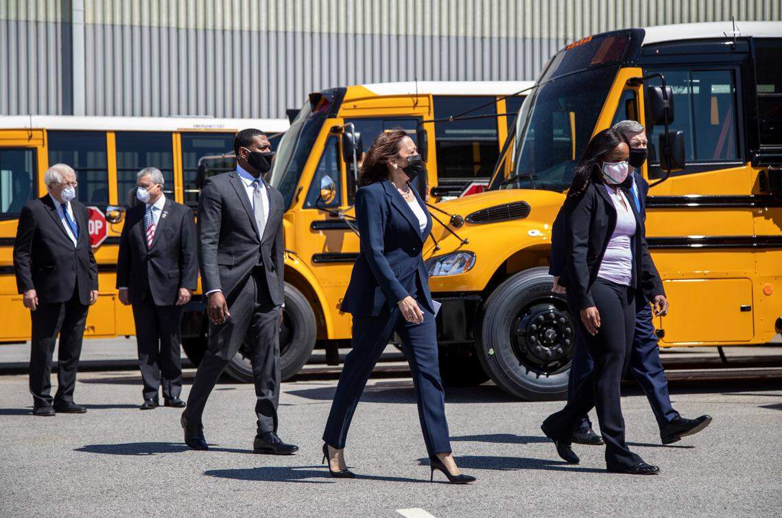 Vice President Kamala Harris, center, tours a Thomas Built Buses factory in High Point on Monday, April 19, 2021, while touting the Biden administration’s infrastructure plan.