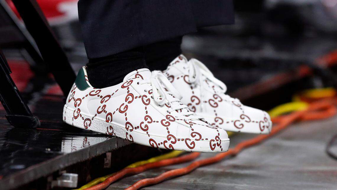 N.C. State head coach Kevin Keatts’ Gucci sneakers, as seen during the second half of N.C. State’s 79-76 victory over UNC at PNC Arena in Raleigh, N.C., Tuesday, December 22, 2020.