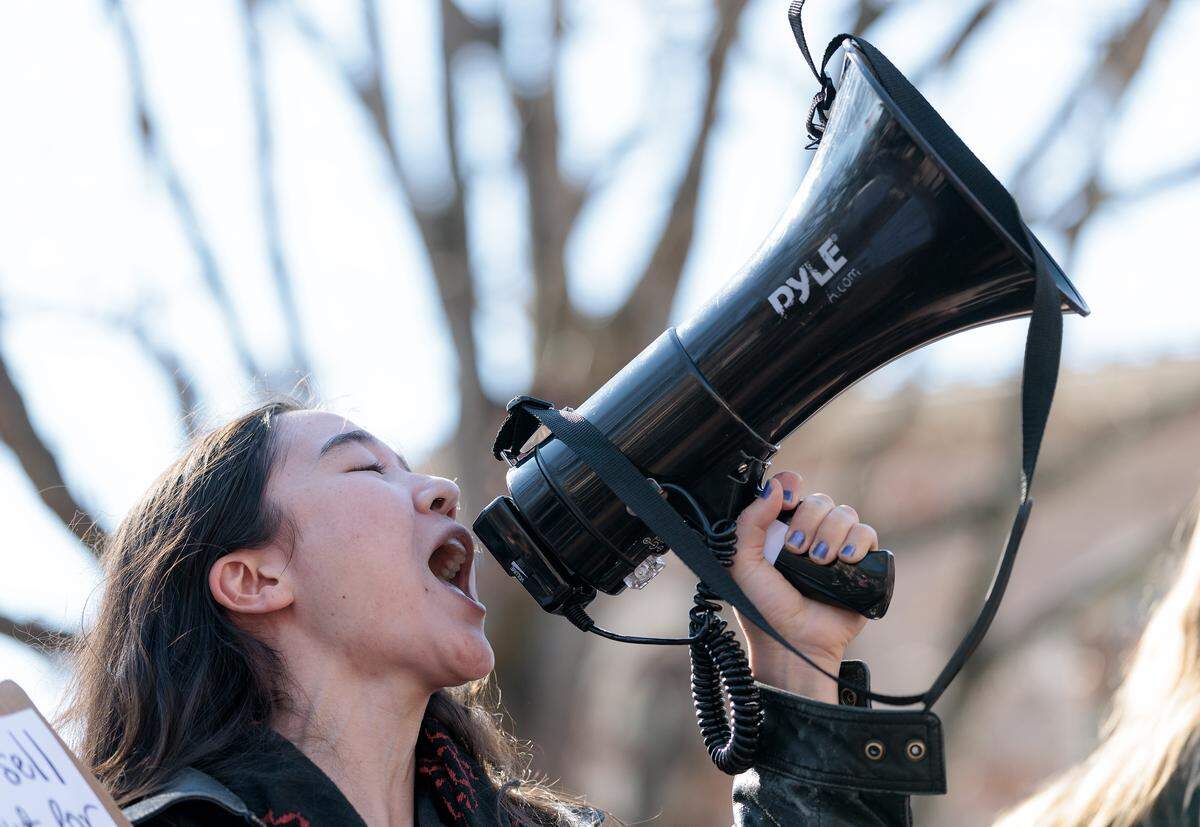 Sophia Brown reacts during a protest at UNC-Chapel Hill on Wednesday, Jan. 7, 2026, held in response to the potential closure of six university study centers that focus on international history, politics and cultures.