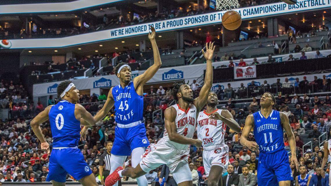 Jaylen Alston (4) of Winston-Salem State faces a strong defense from the Fayetteville State Broncos during the 2020 CIAA Championship game at Spectrum Center in Charlotte in February. The 2021 CIAA basketball season was canceled.