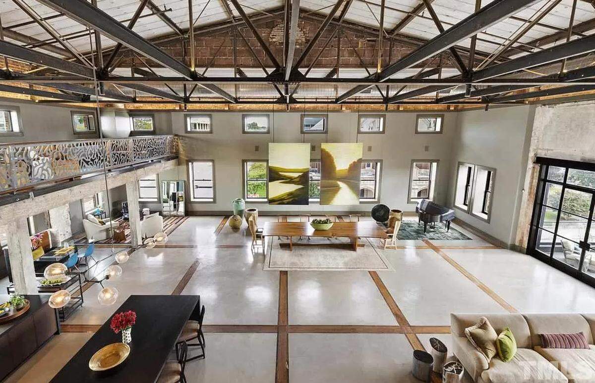 This luxury two-bedroom, three-badroom penthouse has an extremely spacious 9,266 square feet and is located within the historic 300 East Main Street building in downtown Durham.