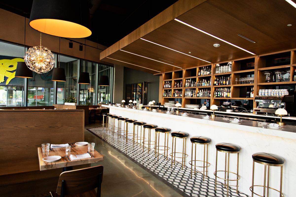 The handsome marble bar inside Cucciolo Terrazza in Raleigh’s North Hills.