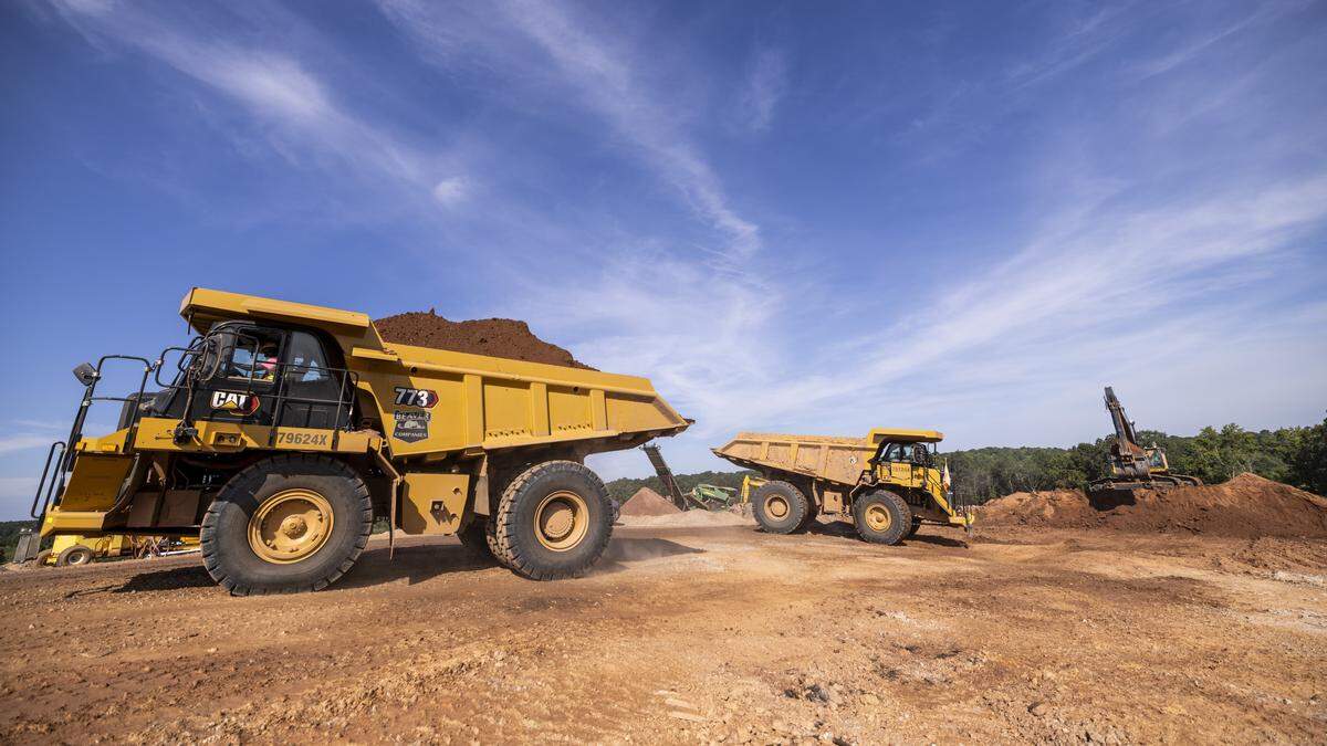 Raleigh-Durham International Airport is replacing its aging main runway with a new, longer one next to it. Before they build it, though, contractors must first create a level surface by moving huge amounts of rock and dirt. That process began this summer and will continue through next year.