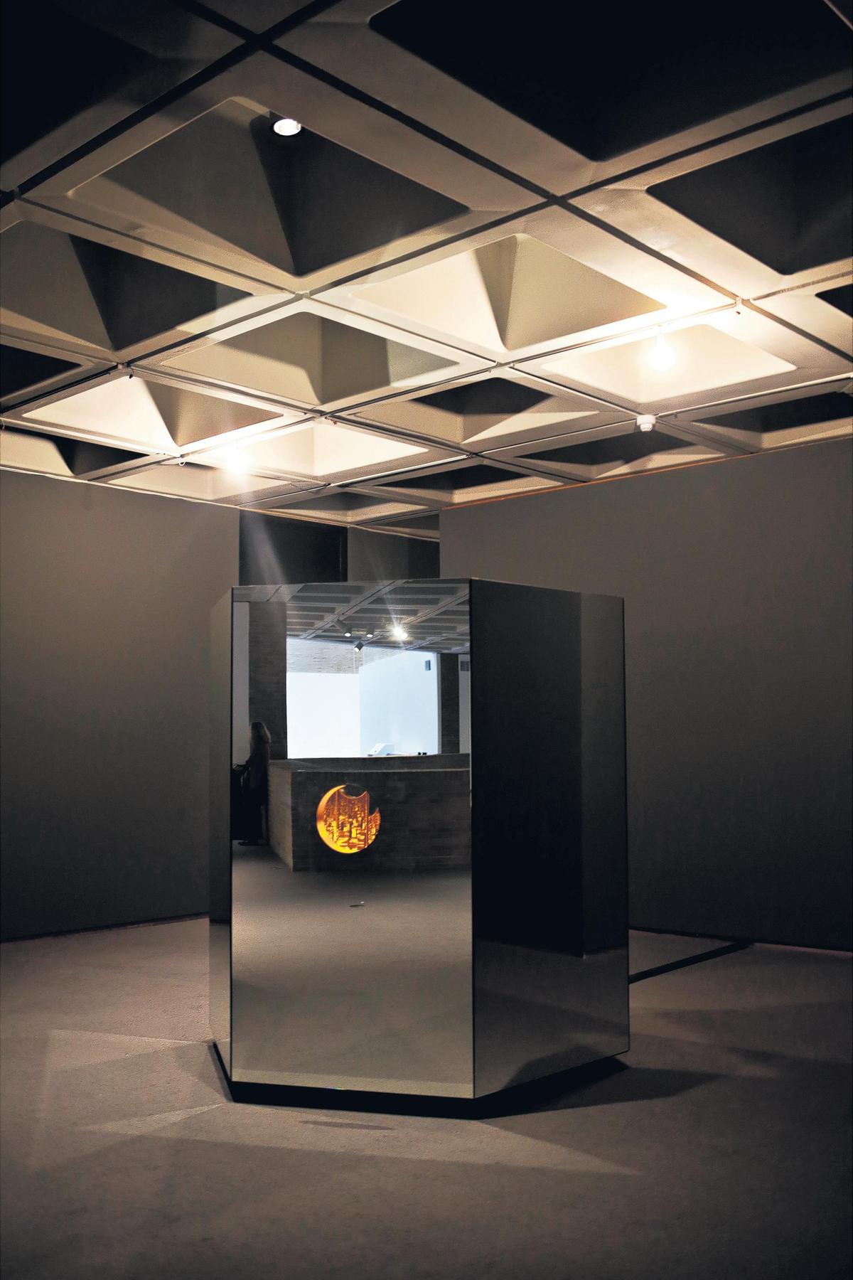 North Carolina Museum of Art acquired Yayoi Kusama’s “Light of Life” in 2018.  From the outside, the piece looks like a mirrored hexagonal box but stick your head inside one of its three portholes, and you’ll see yourself transported into an enclosed “infinity room” of changing colors and patterns. It now is in the museum’s West Gallery.
