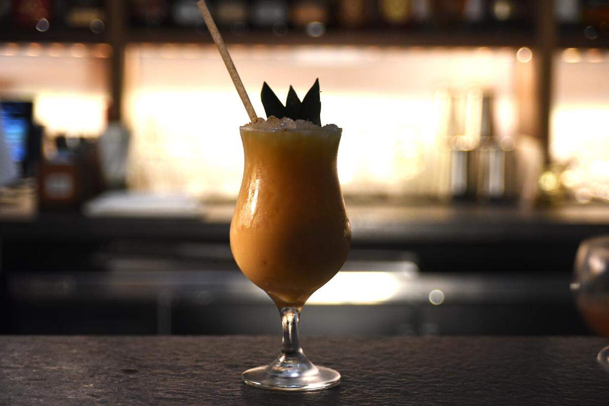 The Painkiller, a cousin of the Pina Colada, made with coconut milk and pineapple, aged rum and a grating of nutmeg, at The Crunkleton in Raleigh.