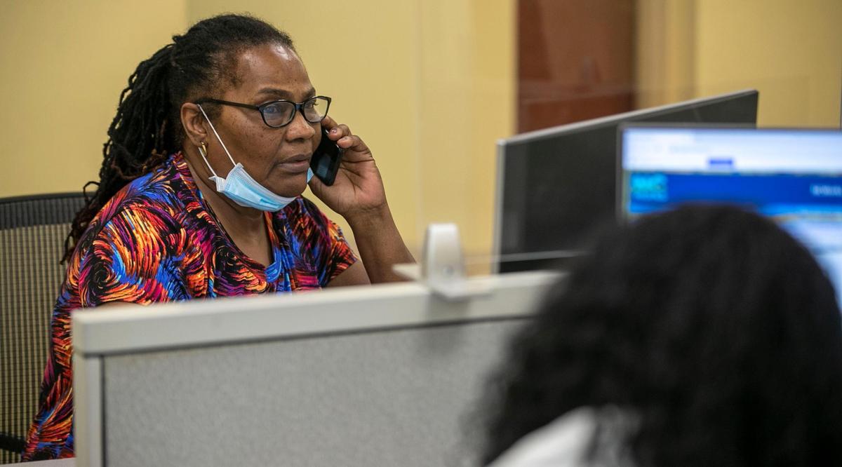 Ann McMillian searches for a job at NCWorks on Tillery Place in Raleigh, N.C on Tuesday, October 26, 2021. McMillian hasn’t had regular work this year after contracting COVID-19 for four months. She is looking for work in home health care. NCWorks provides job seekers and employers as place to connect. They provide assistance with resume building for those seeking work