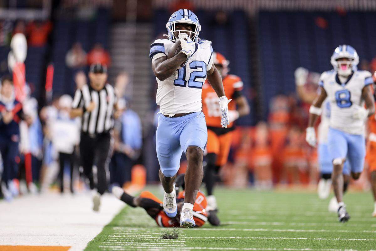Demon June of the North Carolina Tar Heels runs the ball in for a touchdown during the third quarter against the Syracuse Orange at JMA Wireless Dome on Oct. 31, 2025 in Syracuse, New York.