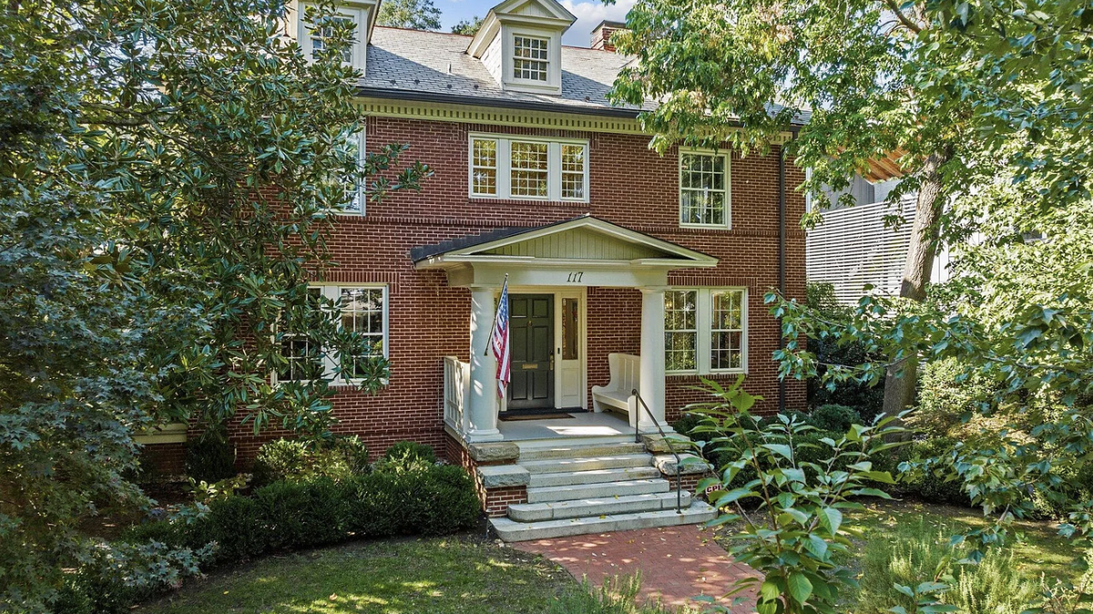 From the front, the 5,682-square-foot three-story home at 117 Hillcrest Road is a traditional Georgian Revival in Raleigh’s Forest Park.