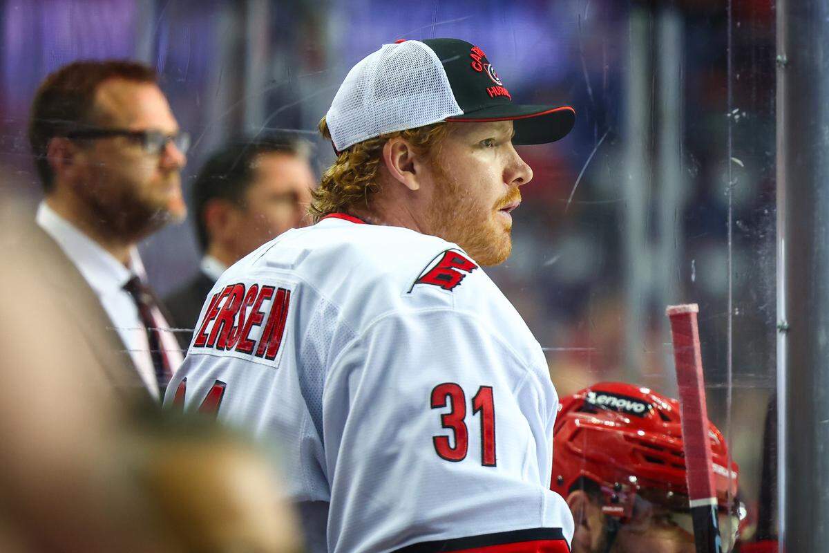 Oct 24, 2024; Calgary, Alberta, CAN; Carolina Hurricanes goaltender Frederik Andersen (31) on his bench against the Calgary Flames during the third period at Scotiabank Saddledome. Sergei Belski-Imagn Images