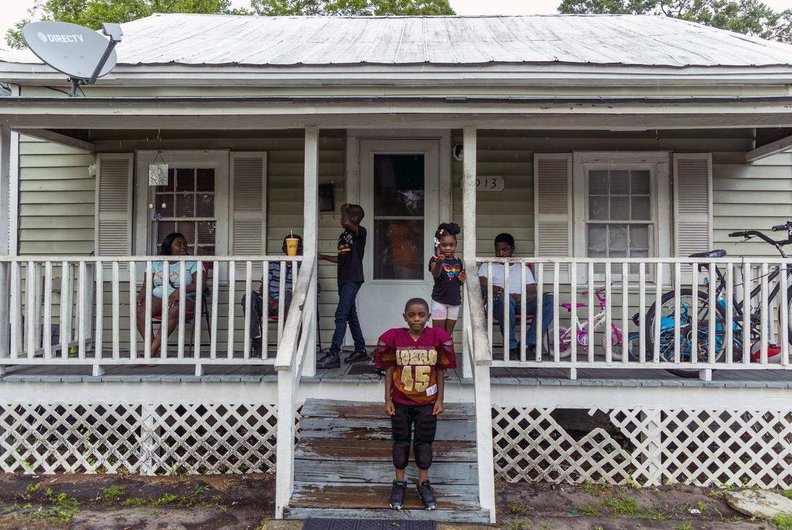 Tony Harris, 6, waits for a ride to football practice from his grandmother’s home where his family is staying as their home still awaits repairs from Hurricane Florence, on Thursday, Aug. 15, 2019, in Wilmington, NC. Harris’ grandmother’s home is located in NC Senate District 8, represented by Republican Sen. Bill Rabon, along with large areas of rural Bladen, Pender and Brunswick counties. The rest of New Hanover County is located in District 9 and represented by Democratic Sen. Harper Peterson.