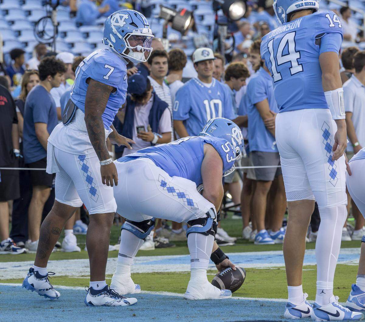 North Carolina quarterback Gio Lopez (7) warms up for the Tar Heels’ season opening game against Texas Christian University on Monday, September 1, 2025 in Chapel Hill, N.C.  