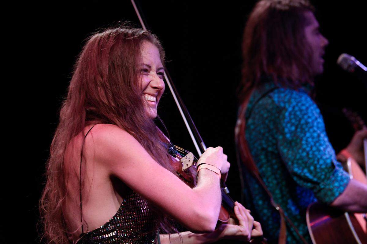 Becca Bisque performs on fiddle as the Sweet Lillies, plays their string-band soul at IBMA’s Bluegrass Ramble in downtown Raleigh, N.C. Tuesday evening, Sept. 28, 2021.