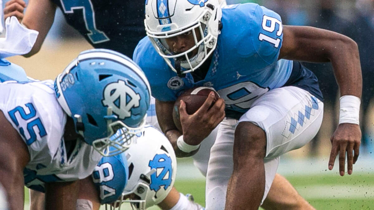 North Carolina running back Ty Chandler (19) carries the ball during the Tar Heels’ Spring football game on Saturday, April 24, 2021 in Chapel Hill, N.C. 
