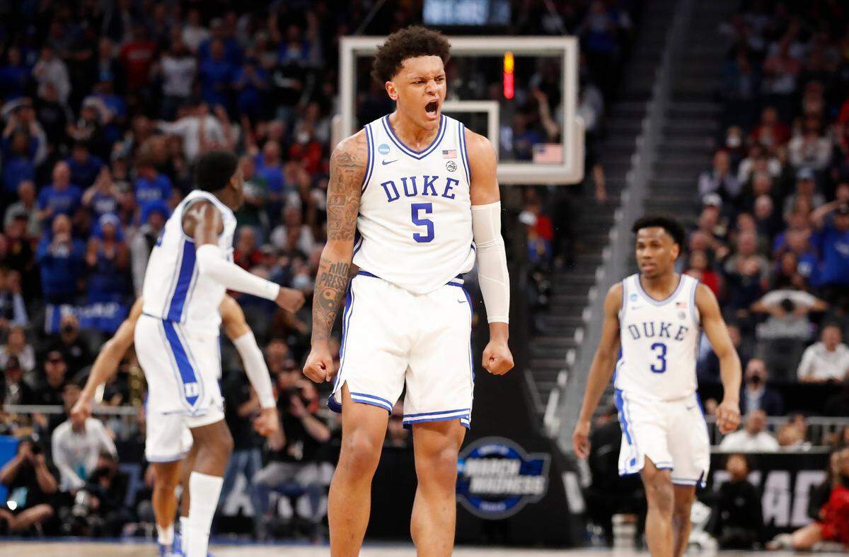 Duke’s Paolo Banchero (5) celebrates after Mark Williams slammed in two during the second half of Duke’s 78-73 victory over Texas Tech in the Sweet 16 round of the NCAA Tournament at the Chase Center in San Francisco, Calif., Thursday, March 24, 2022.