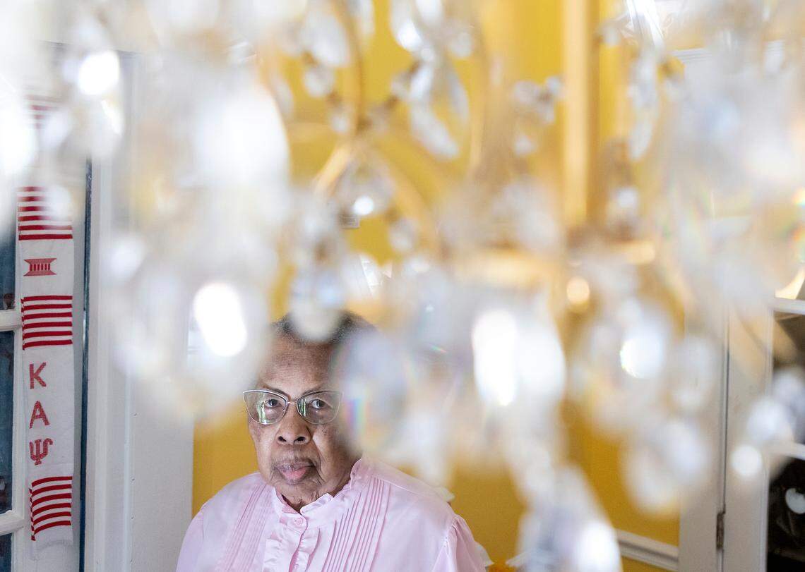 Doris Williams, 91, is photographed in the entryway of her home on Thursday, Jan. 26, 2023, in Raleigh, N.C. The house, which has been home to Williams since she was five years old, was bought in 1879 by her great-grandfather.