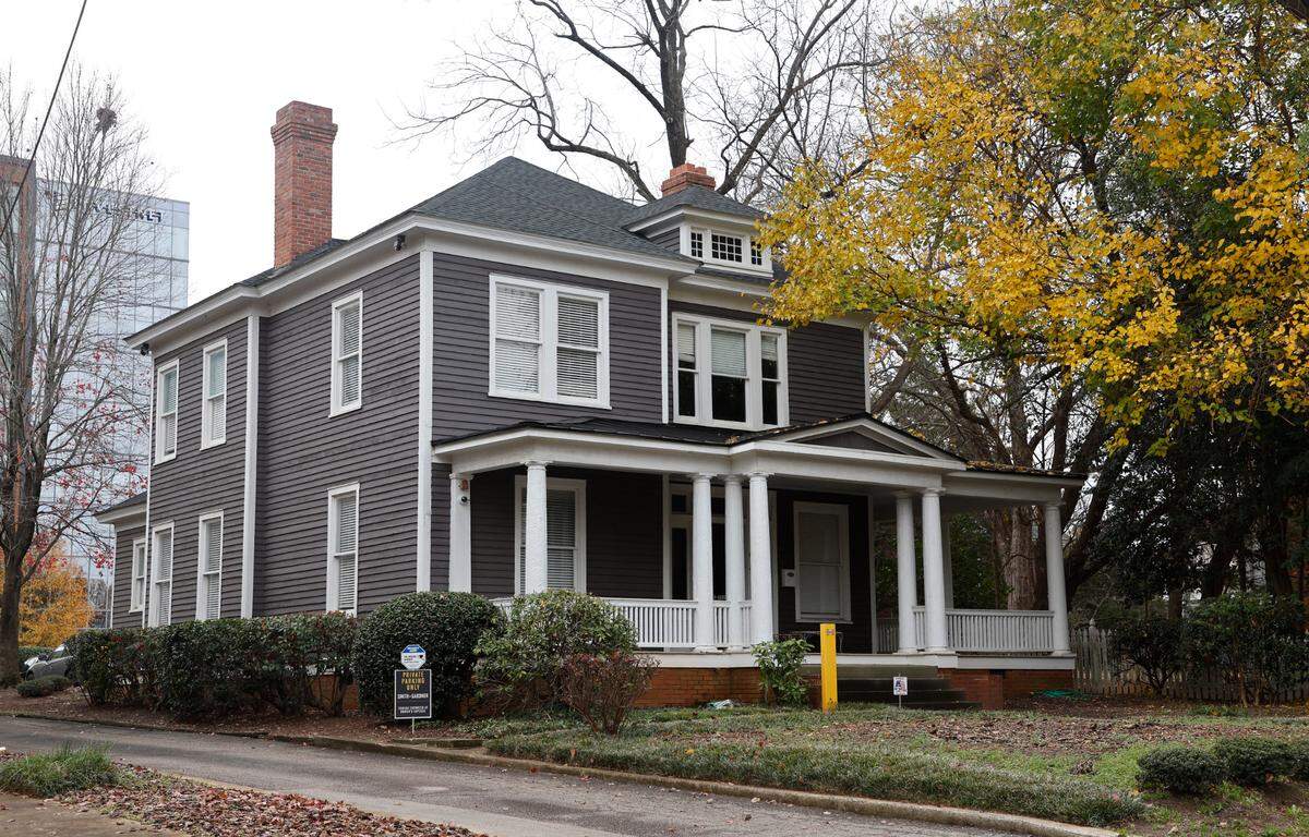 The Society for the Preservation of Historic Oakwood wants to purchase a city-owned parking lot at 411 Morson Street to save historic homes, like this one at 615 Willard Place, from demolition.
