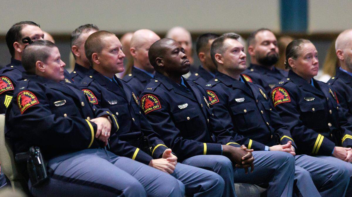 Members of the Raleigh Police Department listen during a promotion ceremony on Friday, May 23, 2025, at Providence Church in Raleigh, N.C.