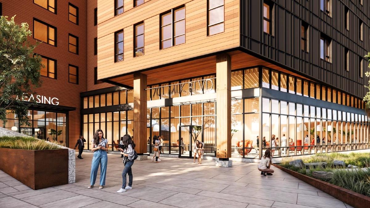 A rendering of apartments proposed for 701 Martin Luther King Jr. Blvd. in Chapel Hill shows a large public plaza at the building’s entrance, where people could gather and wait for the bus.