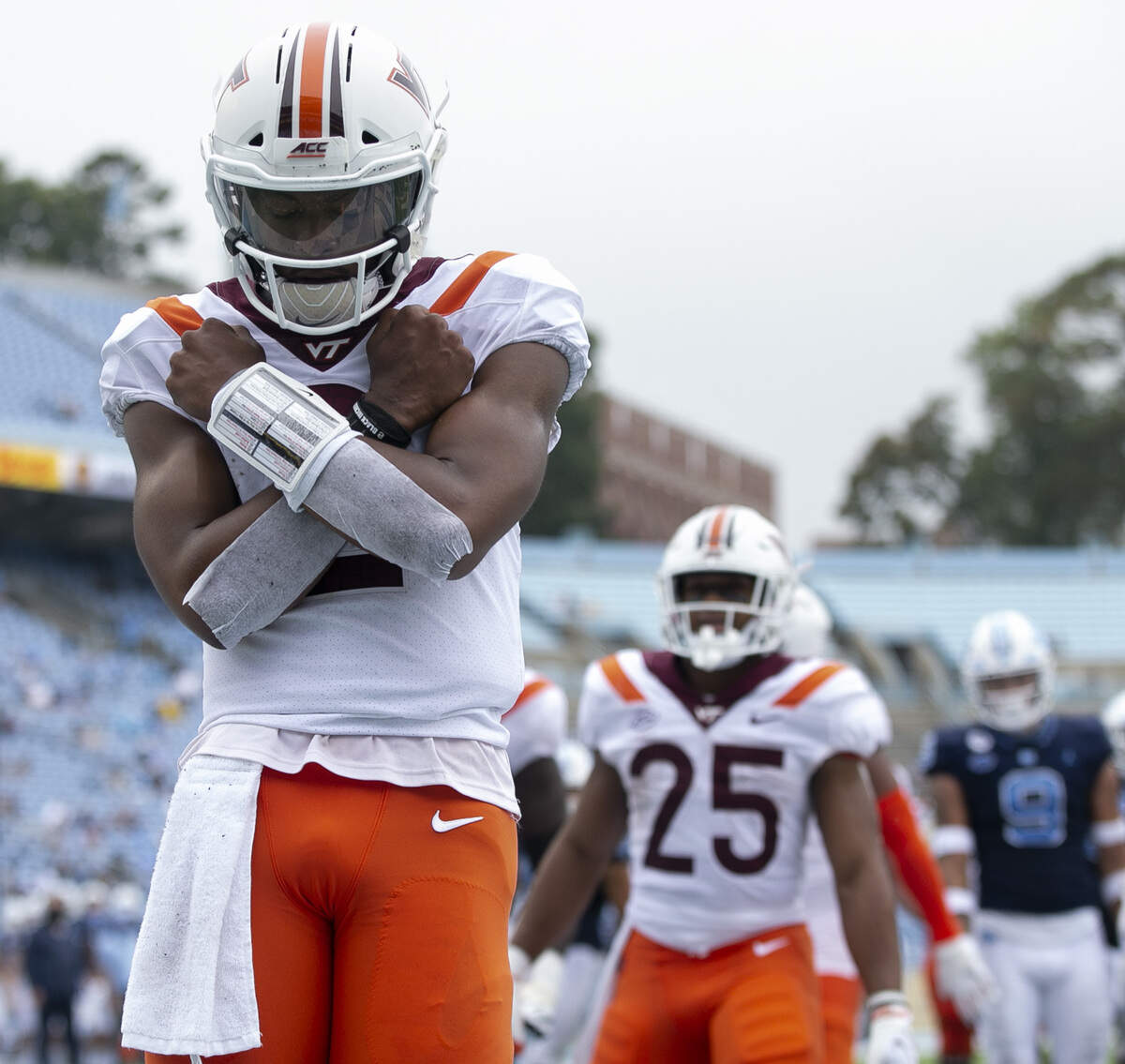 Virginia Tech quarterback Hendon Hooker (2) reacts after scoring on North Carolina’s Tomari Fox (56) on a five-yard carry in the third quarter on Saturday, October 10, 2020 at Kenan Stadium in Chapel Hill, N.C.