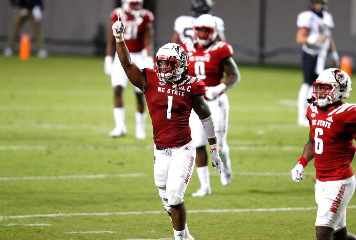N.C. State linebacker Isaiah Moore (1) celebrates after stopping Wake Forest on downs during the second half of N.C. State’s 45-42 victory over Wake Forest at Carter-Finley Stadium in Raleigh, N.C, Saturday, Sept. 19, 2020.