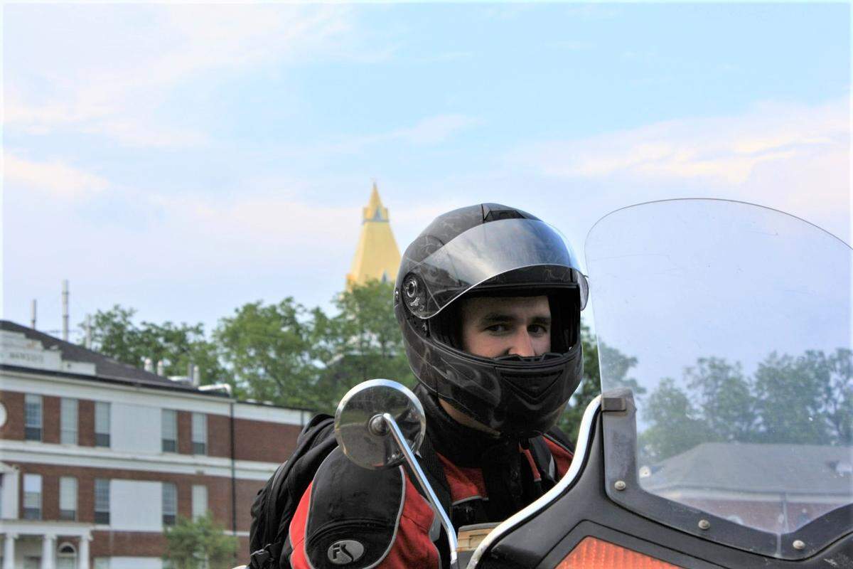 Seth Thomas while on his motorcycle trip with his father Kevin Thomas in May 2012. Both men were struck by lightning on the trip. Seth Thomas is starring in a Super Bowl ad for Wallbox as a lightning strike survivor afraid of electricity.