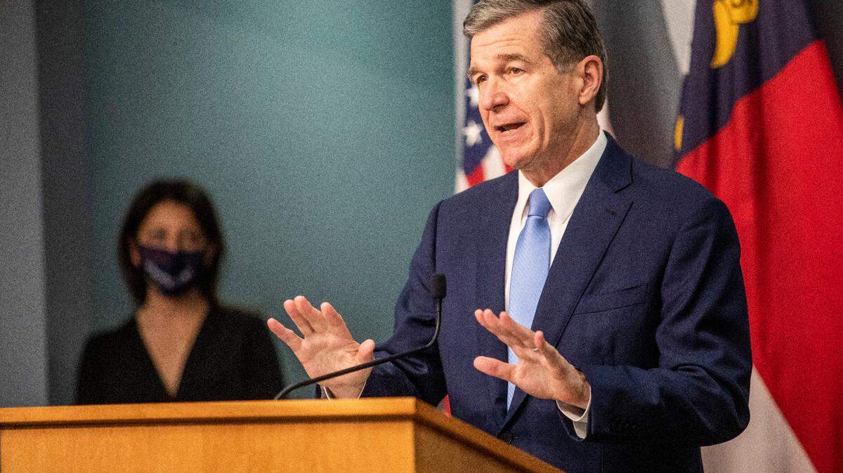 Gov. Roy Cooper speaks during a briefing March 25 on North Carolina’s coronavirus pandemic response. 