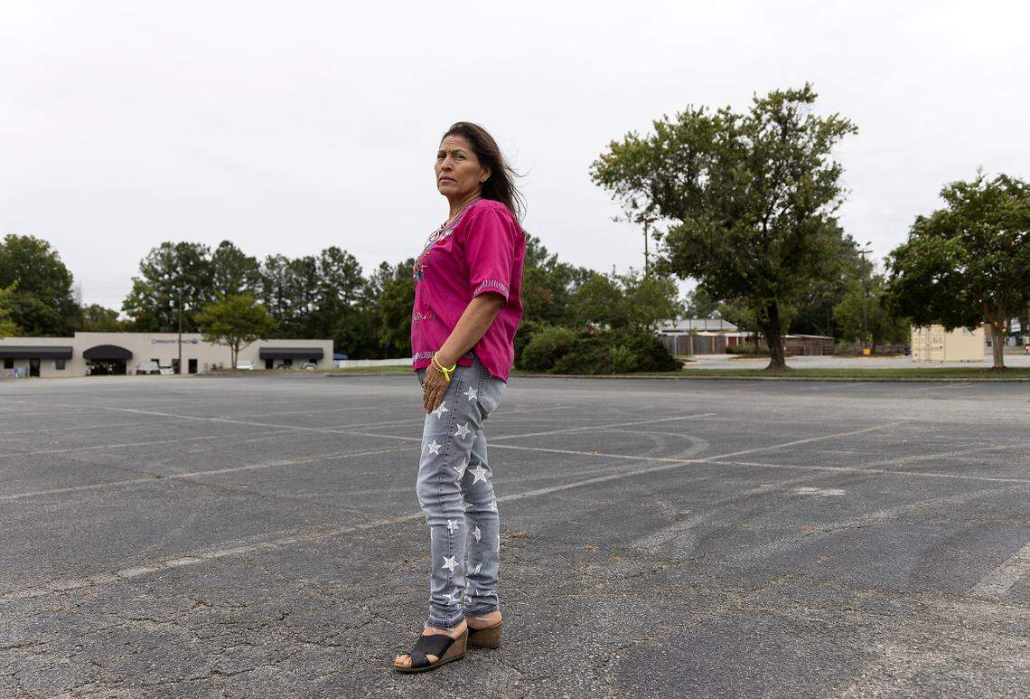 Nery Blandín, a community education worker at El Centro Hispano, is photographed in the Lakewood Plaza shopping center on Friday, Sept. 22, 2023, in Durham, N.C. Blandín’s car was broken into in the parking lot outside of the Latino nonprofit in September.