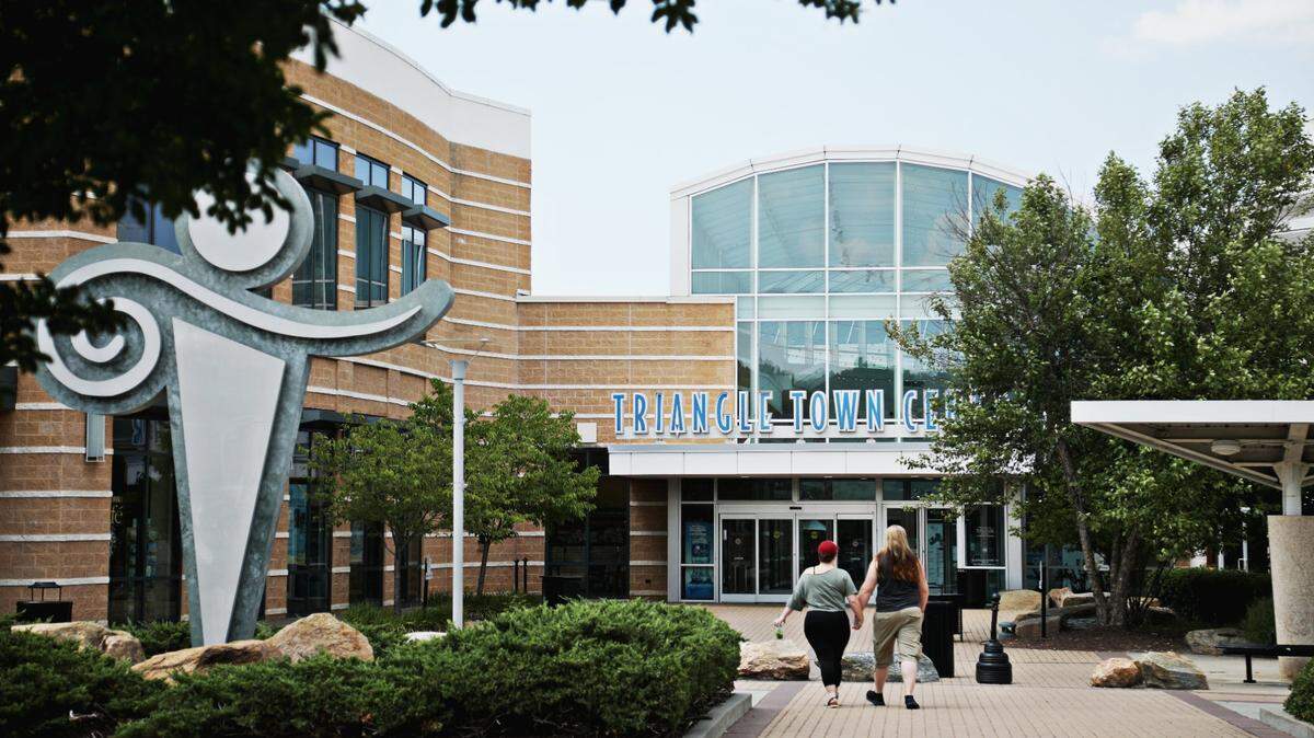 Shoppers enter Triangle Town Center in Raleigh on Tuesday, July 2, 2019.