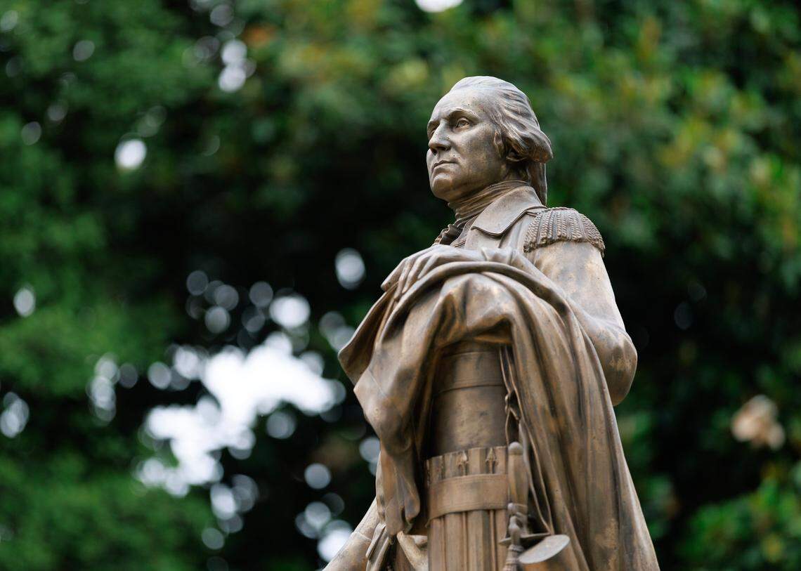 A statue of George Washington stands on the grounds of the North Carolina State Capitol in Raleigh.
