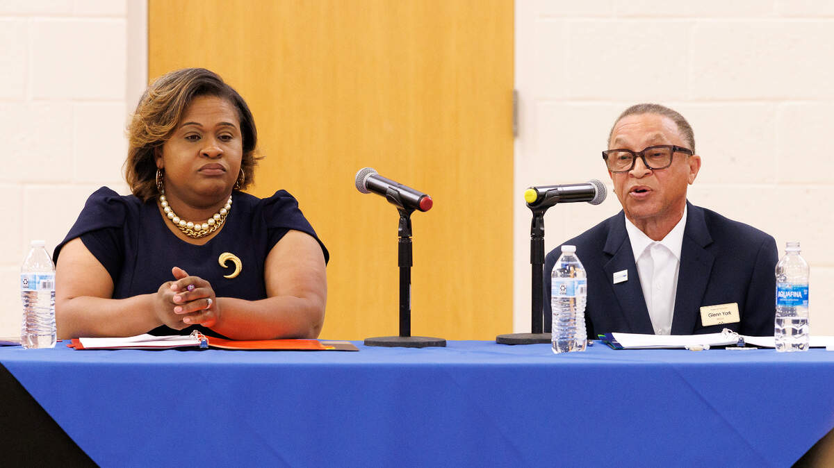 Zebulon Mayor Pro Tem Jessica Harrison listens as Mayor Glenn York speaks during a town hall meeting on Monday, April 28, 2025, at Zebulon Community Center.