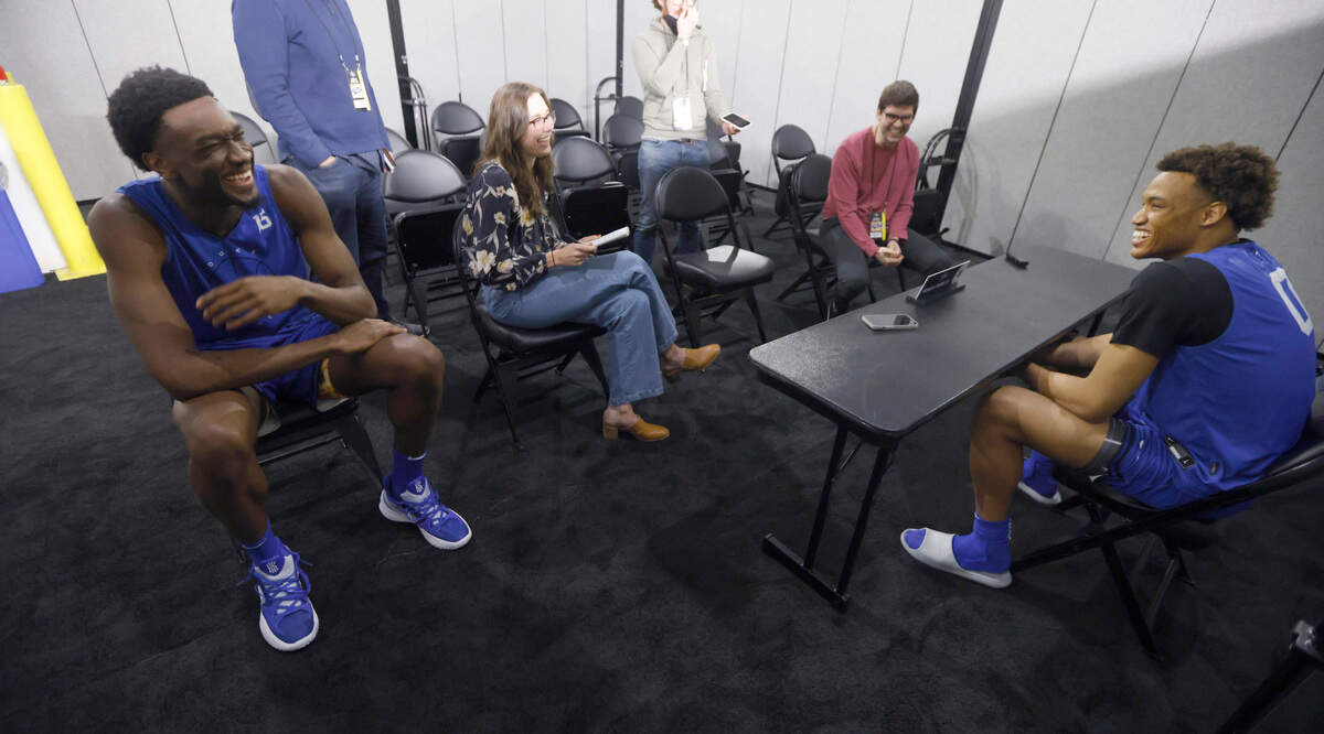 Duke’s Mark Williams laughs with Wendell Moore Jr. while listening in to Moore’s press availability on Friday, March 25, 2022, at the Chase Center in San Francisco, Calif. Duke plays Arkansas in the NCAA Tournament Elite 8 Saturday.