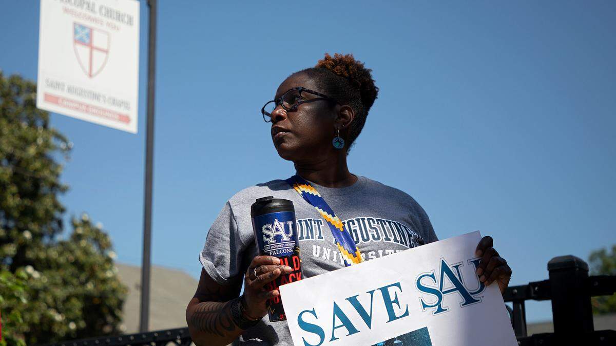 Nikki Dublin Turner, a St. Augustine’s alumna and Raleigh native, prepares to march around the perimeter of the university’s campus during a rally in Raleigh, N.C. on Monday, April 29, 2024. The event was organized by the Capital City Hope Foundation, Falcons Unite, and the SAVESAU Coalition.