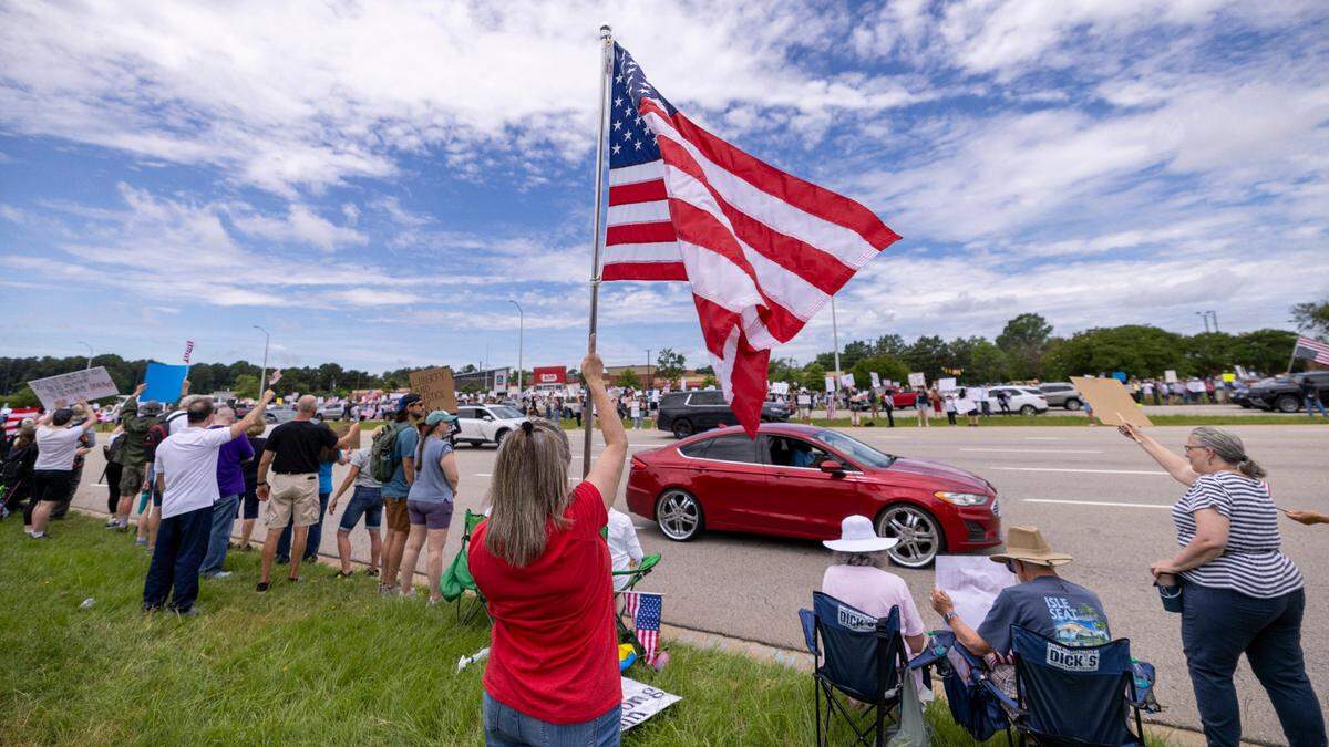 More than 1500 demonstrators lined Capital Boulevard to protest the policies and tactics of the of President Donald Trump on Saturday, June 14, 2025 near Triangle Town Center in Raleigh. The Raleigh “No Kings” rally was one of dozens across North Carolina and hundreds nationwide on what organizers called a nationwide day of defiance against the Trump administration.