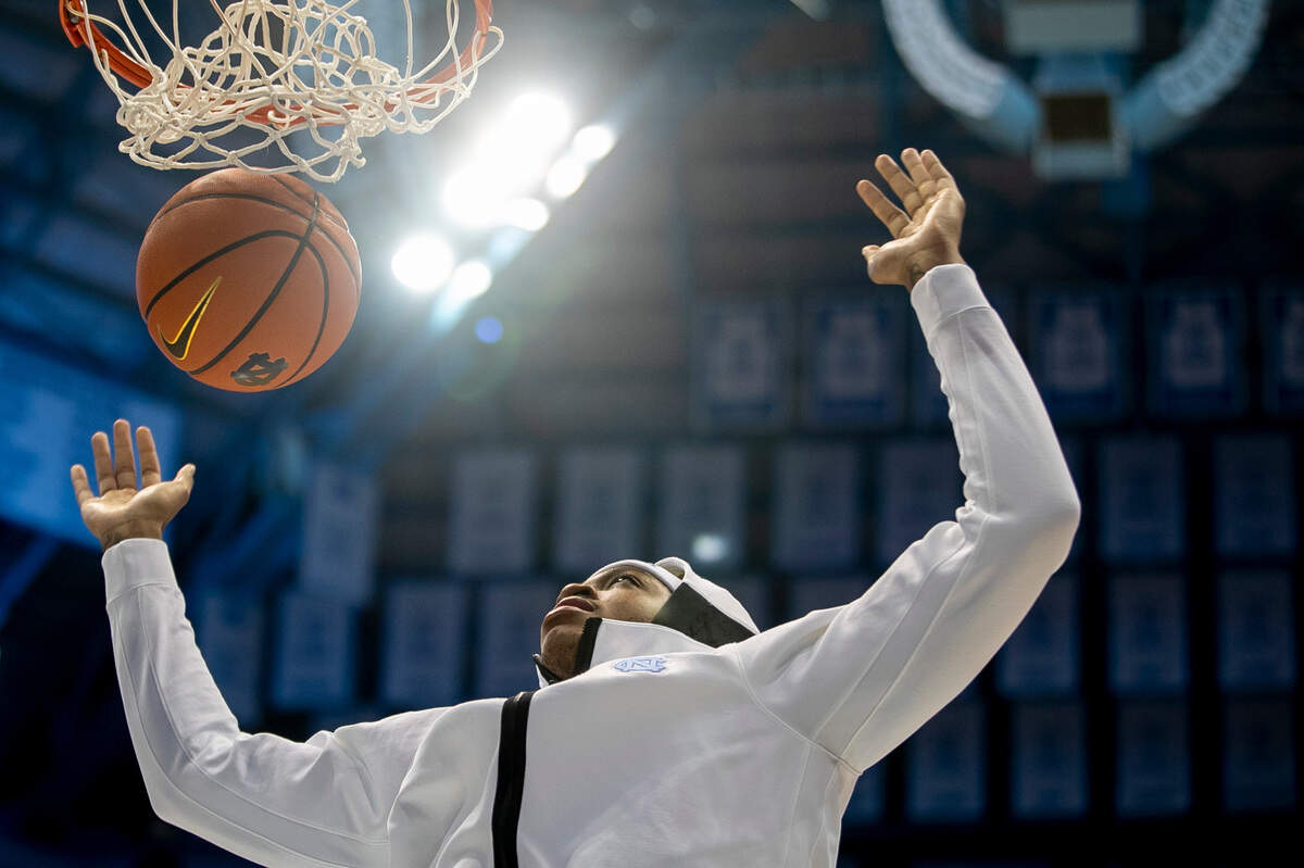 North Carolina’s Armando Bacot (5) dunks as he warms up for the Tar Heels’ game against Gardner-Webb on Tuesday, November 15, 2022 at the Smith Center in Chapel Hill, N.C.