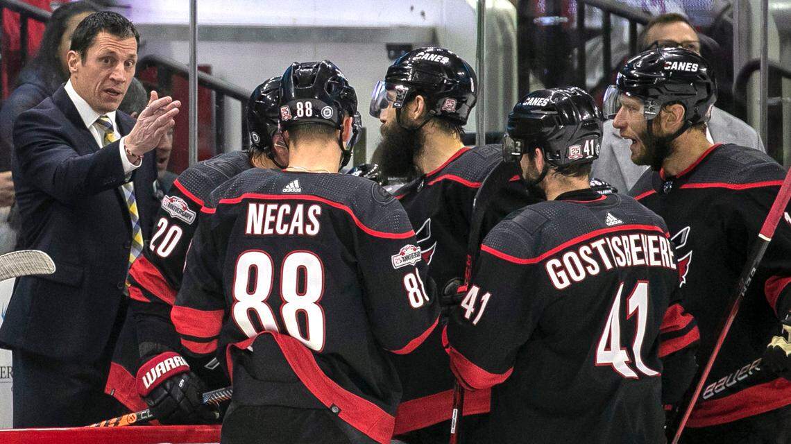 Carolina Hurricanes’ coach Rod Brind’Amour talks with his players during a time out in the first period against Ottawa on Tuesday, April 4, 2023 at PNC Arena in Raleigh, N.C.