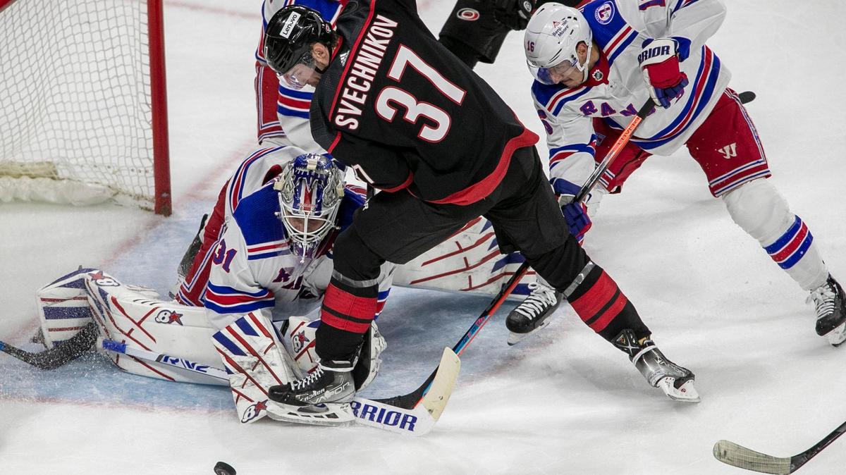 New York Rangers’ goalie Igor Shesterkin (31) stops a scoring attempt by Carolina Hurricanes’ Andrei Svechnikov (37) in the first period on Monday, May 30, 2022 during game seven of the Stanley Cup second round at PNC Arena in Raleigh, N.C.