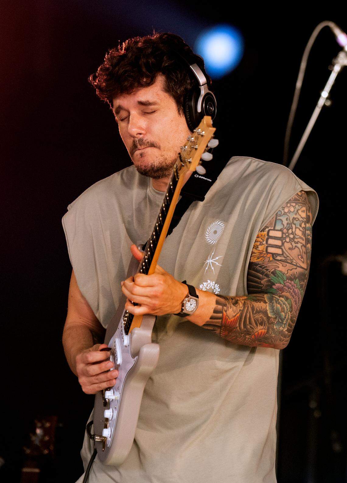 John Mayer, complete with headphones, performs as Dead & Company bring their final tour to Raleigh, N.C.’s Coastal Credit Union Music Park at Walnut Creek, Thursday night, June 1, 2023.