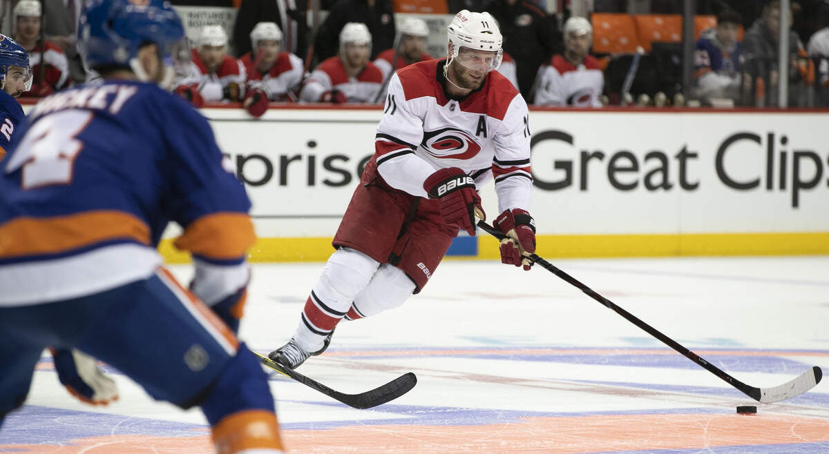 Carolina Hurricanes’ Jordan Staal (11) controls to the puck ahead of New York Islanders’ Thomas Hickey (4) in the first period during Game 1 of the second round Stanley Cup series on Friday, April 26, 2019 at Barclays Center in Brooklyn, N.Y.