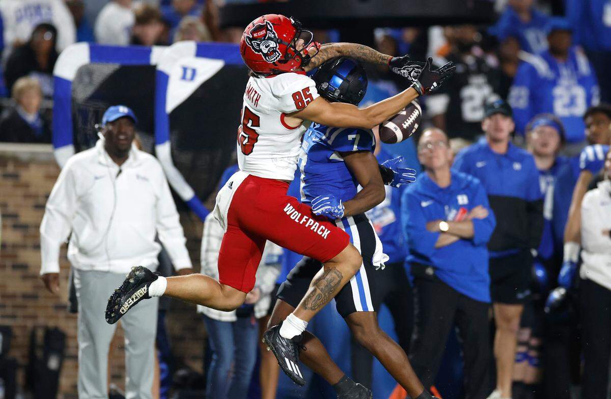 N.C. State wide receiver Anthony Smith (85) can’t pull in the pass while Duke cornerback Al Blades Jr. (7) defends during the first half of N.C. State’s game against Duke at Wallace Wade Stadium in Durham, N.C., Saturday, Oct. 14, 2023. There was no call on the play.