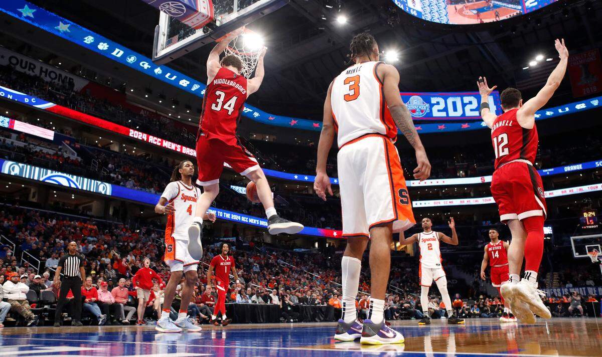 N.C. State’s Ben Middlebrooks (34) slams in two during N.C. State’s 83-65 victory over Syracuse in the second round of the 2024 ACC Men’s Basketball Tournament at Capital One Arena in Washington, D.C., Wednesday, March 13, 2024.