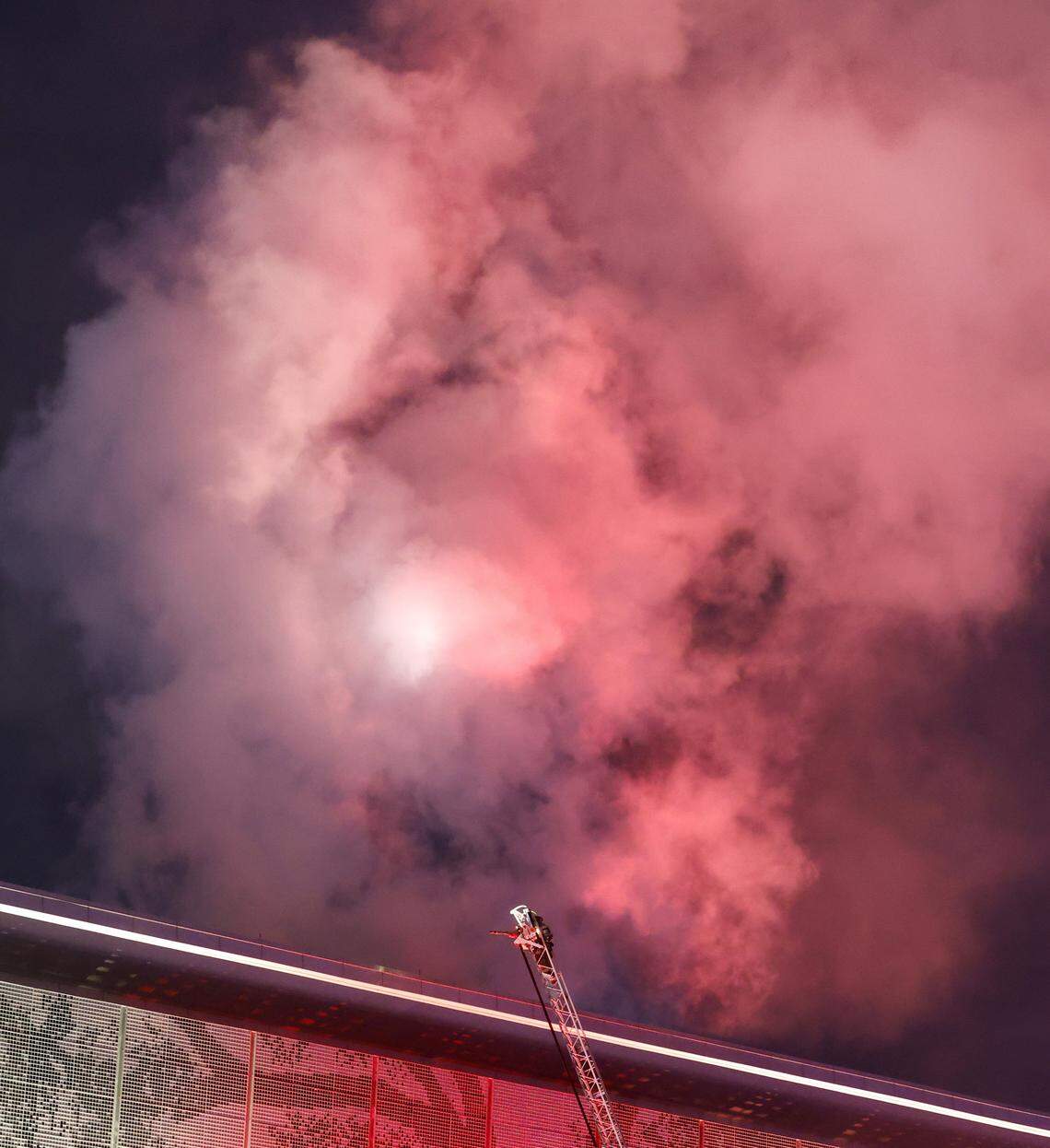 Firefighters battle a blaze at the Raleigh Convention Center in downtown Raleigh, N.C., Monday evening, Dec. 1, 2025.