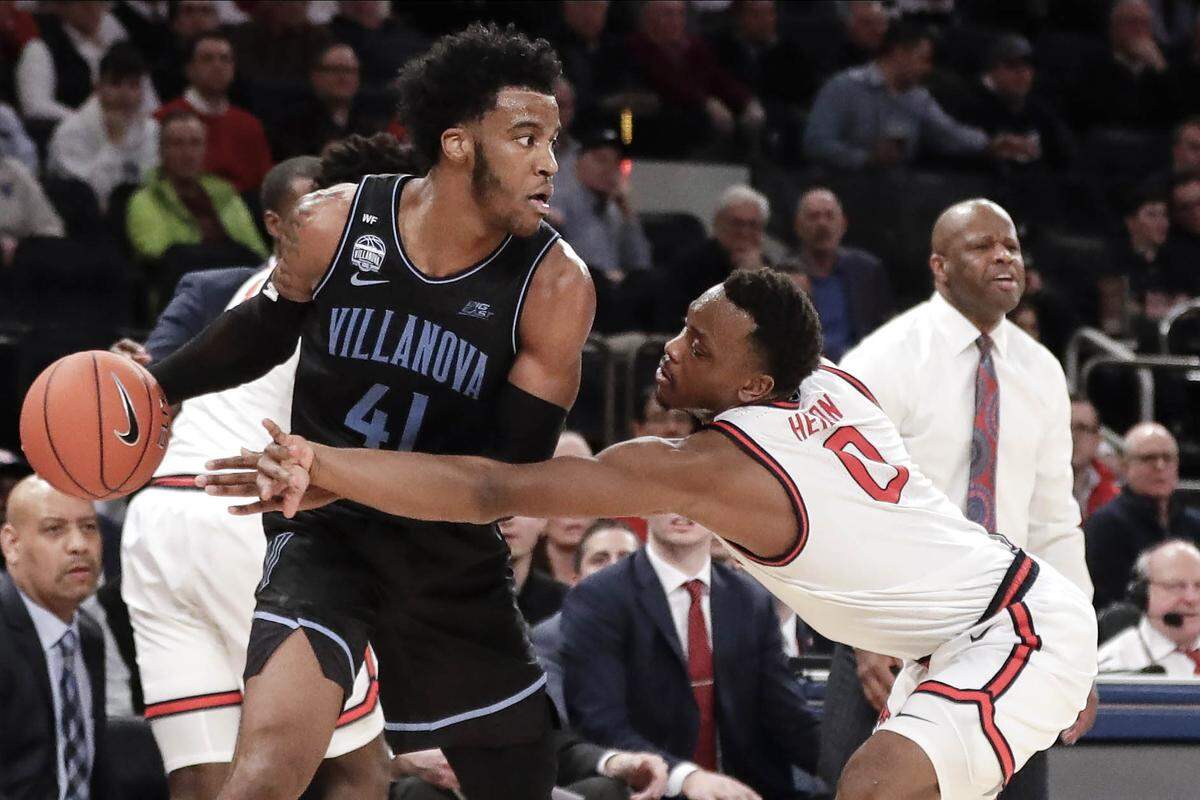 St. John’s Mustapha Heron (0) defends Villanova’s Saddiq Bey (41) during their game Tuesday, Jan. 28, 2020, in New York.