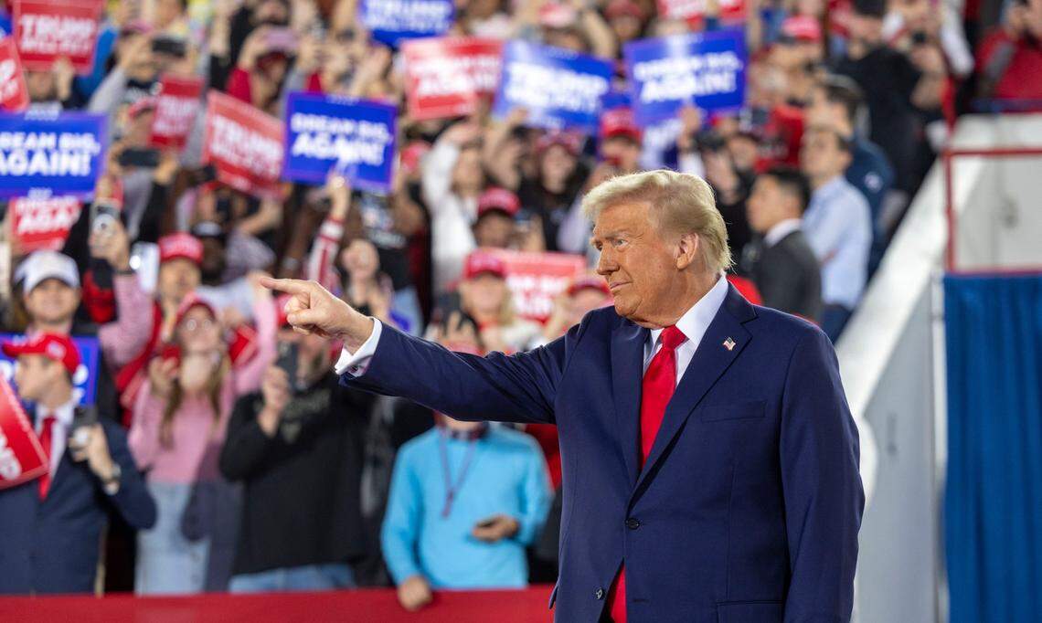 Republican presidential nominee and former President Donald Trump takes the stage during a rally at Dorton Arena in Raleigh on Monday, Nov. 4, 2024, one day before Election Day.